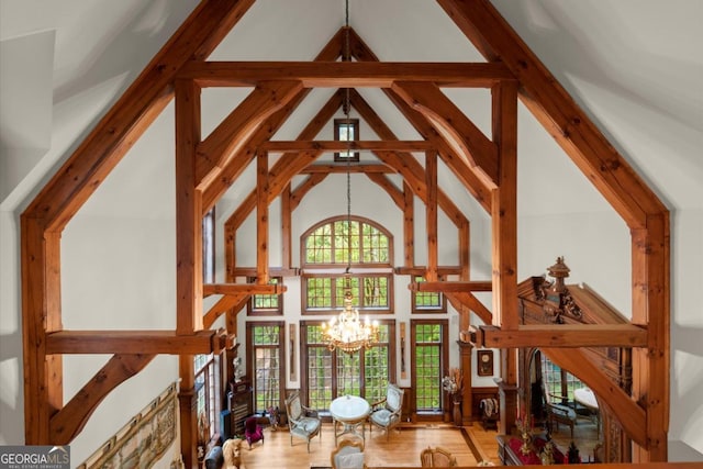 3863 Streamside Dr SE, Marietta, GA 30067 - interior space featuring an inviting chandelier and high vaulted ceiling
