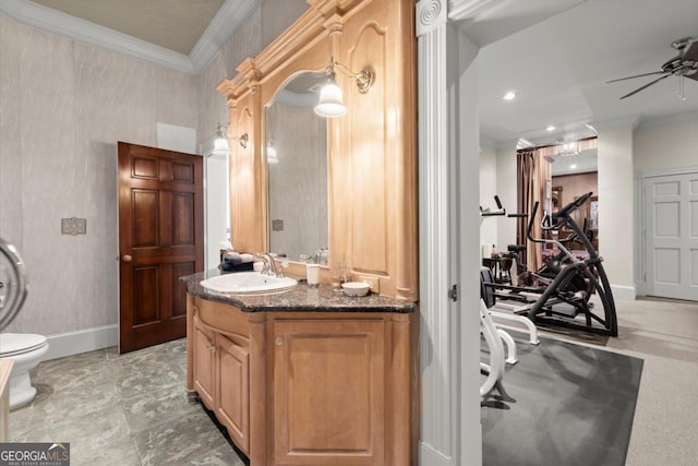 3863 Streamside Dr SE, Marietta, GA 30067 - bathroom with toilet, a ceiling fan, crown molding, baseboards, and vanity