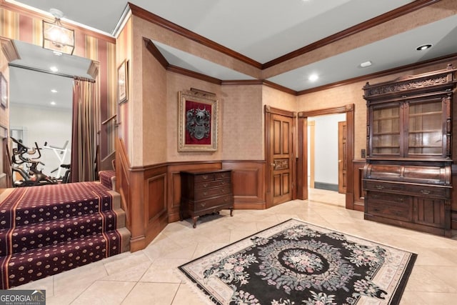 3863 Streamside Dr SE, Marietta, GA 30067 - foyer entrance with crown molding, a decorative wall, wainscoting, and recessed lighting