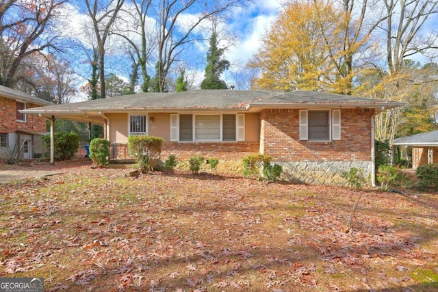 1815 Windsor Dr SW, Atlanta, GA 30311 - ranch-style house with brick siding and an attached carport