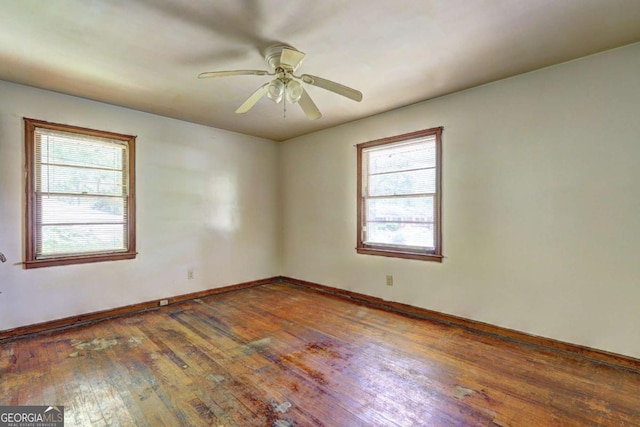 1815 Windsor Dr SW, Atlanta, GA 30311 - unfurnished room with wood-type flooring, baseboards, and a ceiling fan