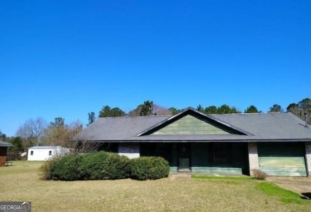 540 Veneys Mill Pond Rd, Parrott, GA 39877 - view of front of home with concrete driveway, an attached garage, and a front yard