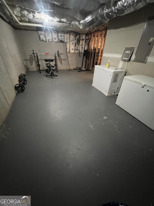 7491 Hilltop Way, Atlanta, GA 30349 - unfinished below grade area featuring refrigerator