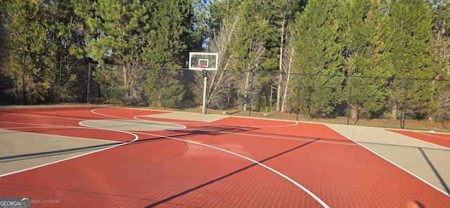 7491 Hilltop Way, Atlanta, GA 30349 - view of basketball court featuring community basketball court and a forest view