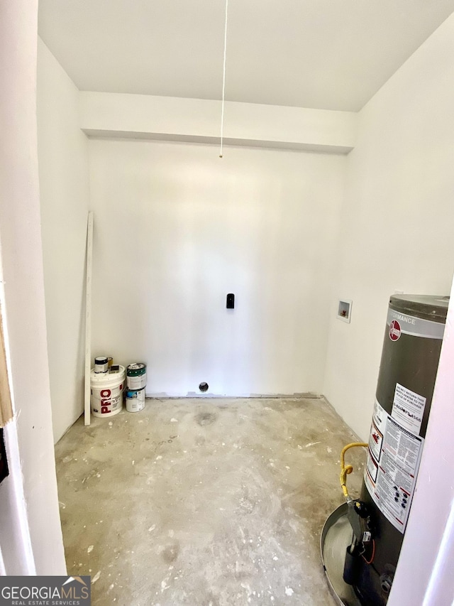 laundry area featuring gas water heater and hookup for a washing machine
