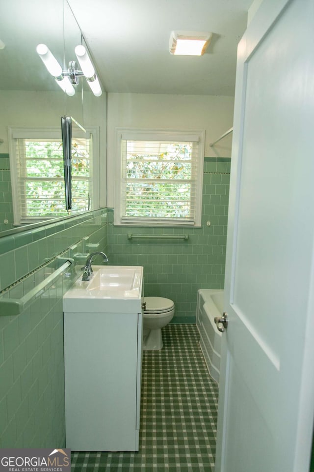 1468 N Amanda Cir, Atlanta, GA 30329 - full bath with toilet, tile walls, tile patterned flooring, and plenty of natural light