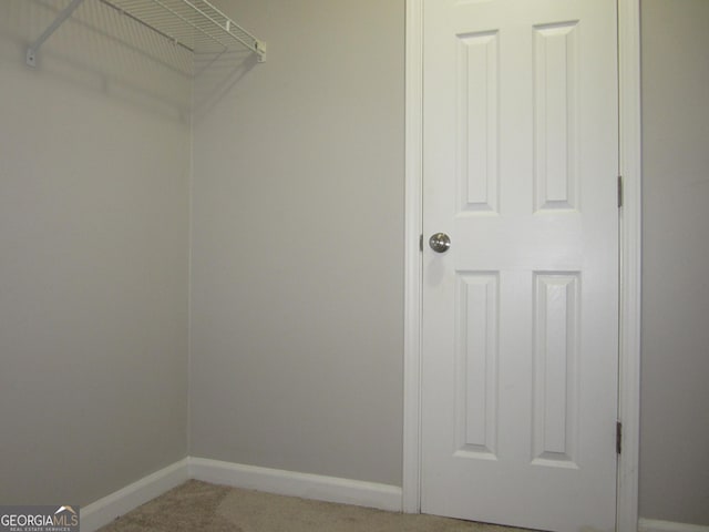 4018 Woodridge Way, Tucker, GA 30084 - walk in closet featuring light carpet
