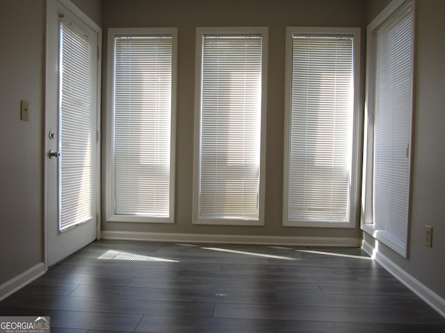 4018 Woodridge Way, Tucker, GA 30084 - unfurnished room with baseboards and wood finished floors