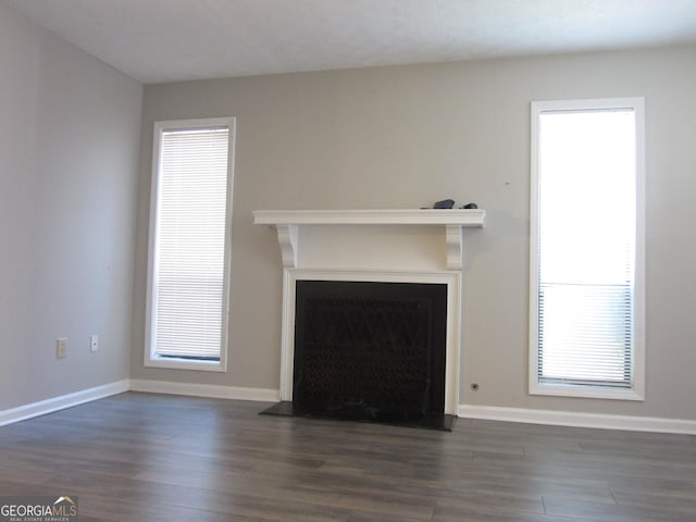 4018 Woodridge Way, Tucker, GA 30084 - unfurnished living room featuring a fireplace, baseboards, and dark wood-style floors
