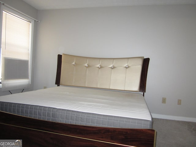 4018 Woodridge Way, Tucker, GA 30084 - carpeted bedroom featuring baseboards