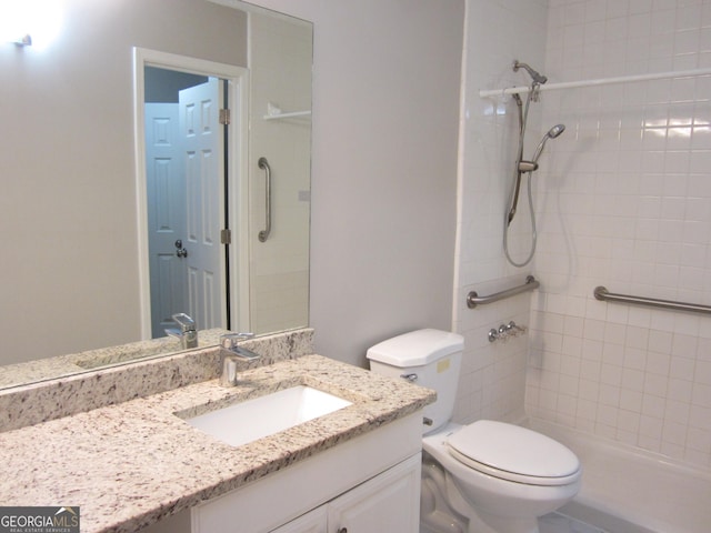 4018 Woodridge Way, Tucker, GA 30084 - bathroom featuring vanity, toilet, and a stall shower