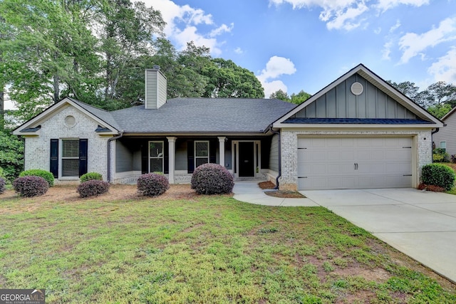 ranch-style home featuring a garage, a chimney, board and batten siding, a front yard, and driveway