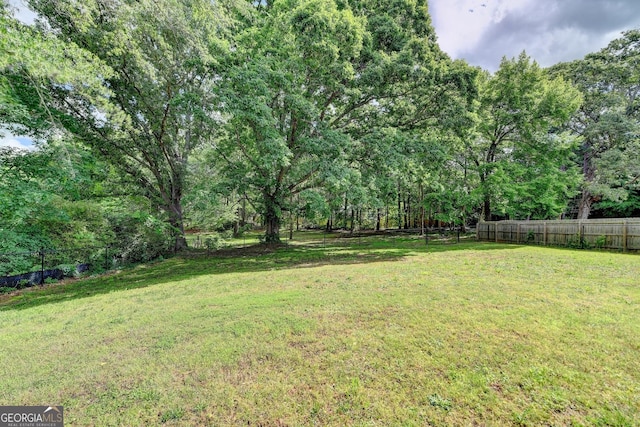 view of yard featuring fence