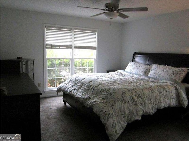 bedroom featuring ceiling fan and carpet flooring
