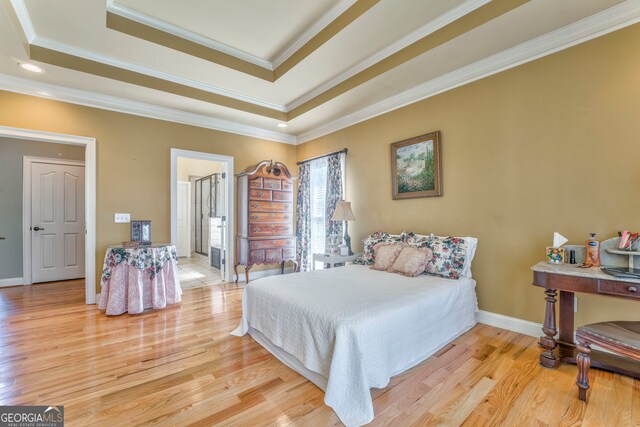 bedroom featuring light wood-type flooring, a tray ceiling, baseboards, ornamental molding, and recessed lighting