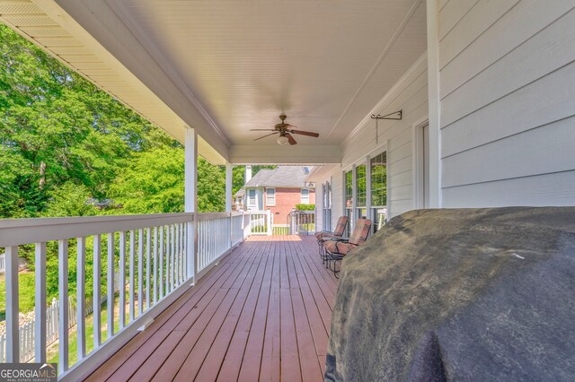 wooden deck with ceiling fan