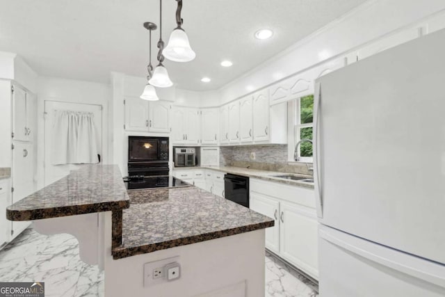 kitchen featuring tasteful backsplash, marble finish floor, a sink, black appliances, and white cabinets