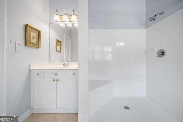 295 River Laurel Way, Woodstock, GA 30188 - bathroom with vanity, tile patterned flooring, and a tile shower
