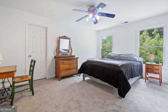295 River Laurel Way, Woodstock, GA 30188 - bedroom featuring light carpet, a ceiling fan, and visible vents