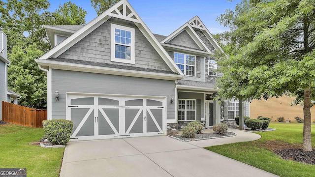 70 Pacific Ave, Sharpsburg, GA 30277 - craftsman-style house featuring concrete driveway, a garage, and a shingled roof
