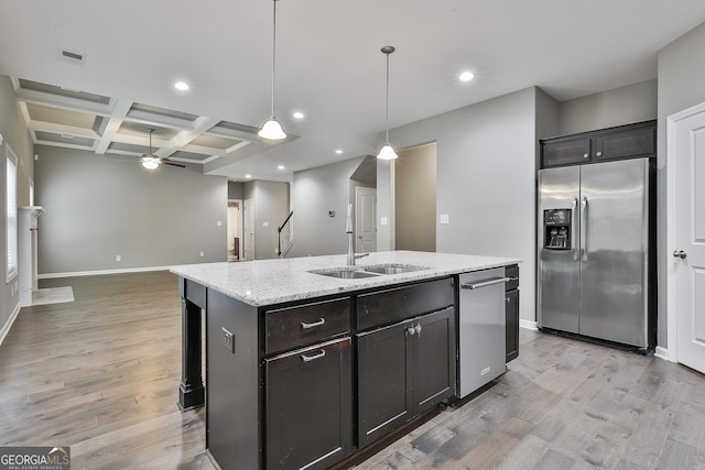 70 Pacific Ave, Sharpsburg, GA 30277 - kitchen featuring stainless steel appliances, ceiling fan, coffered ceiling, baseboards, and light wood-style flooring