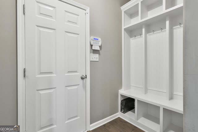 70 Pacific Ave, Sharpsburg, GA 30277 - mudroom featuring baseboards and dark wood finished floors