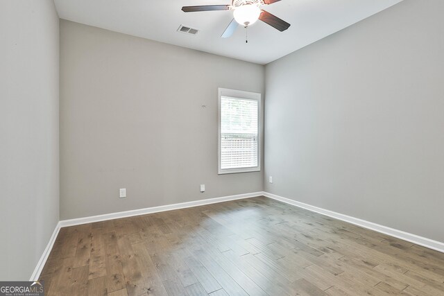 70 Pacific Ave, Sharpsburg, GA 30277 - empty room with a ceiling fan, wood finished floors, and baseboards