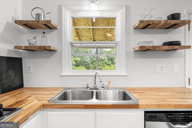 142 Poplar St SW, Calhoun, GA 30701 - kitchen with open shelves, appliances with stainless steel finishes, a sink, and butcher block countertops