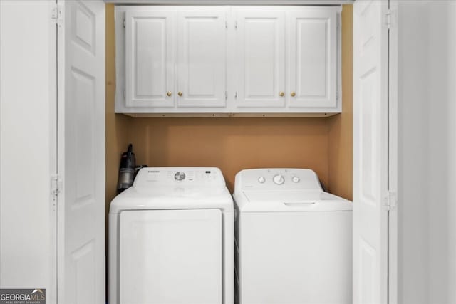 142 Poplar St SW, Calhoun, GA 30701 - washroom with washing machine and dryer and cabinet space