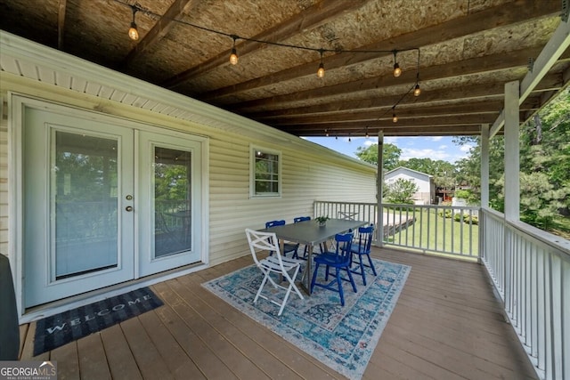 142 Poplar St SW, Calhoun, GA 30701 - wooden terrace with outdoor dining area and french doors
