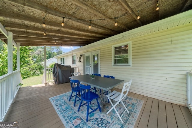 142 Poplar St SW, Calhoun, GA 30701 - wooden deck featuring area for grilling, french doors, and outdoor dining space