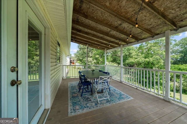 142 Poplar St SW, Calhoun, GA 30701 - deck featuring outdoor dining space