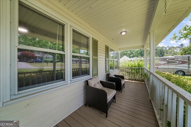 142 Poplar St SW, Calhoun, GA 30701 - deck featuring covered porch