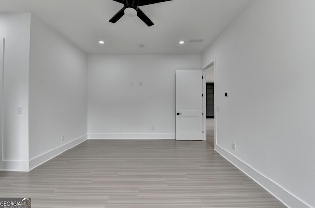 unfurnished room with baseboards, a ceiling fan, visible vents, and recessed lighting