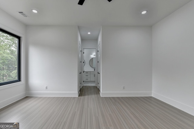 unfurnished bedroom featuring visible vents, baseboards, a ceiling fan, and recessed lighting