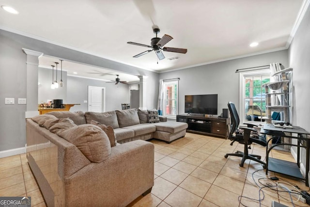 living room featuring ceiling fan, ornamental molding, and light tile patterned floors