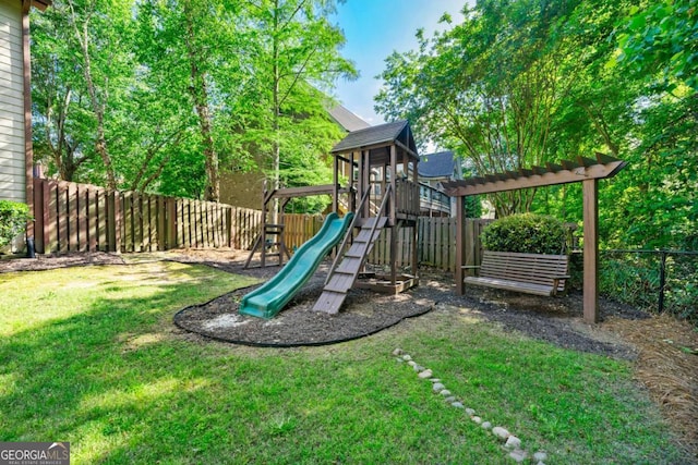 view of jungle gym featuring a yard and a fenced backyard