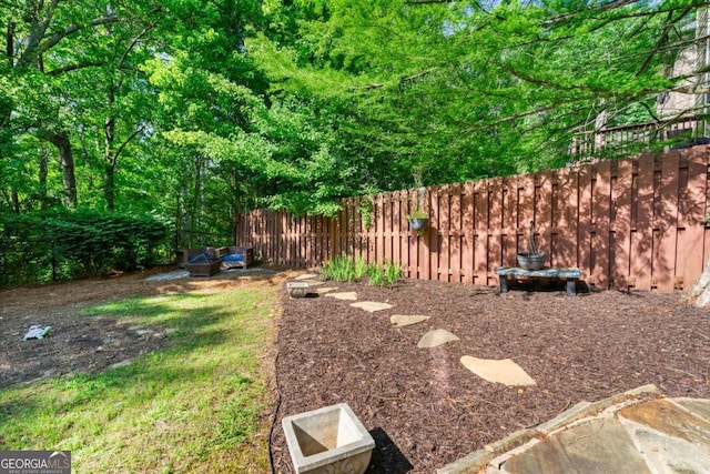 view of yard with fence