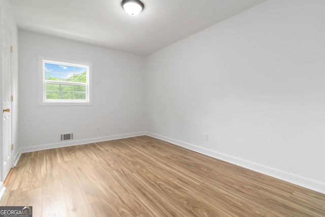 3781 Cherokee Trl, Suwanee, GA 30024 - empty room featuring light wood-style flooring and baseboards