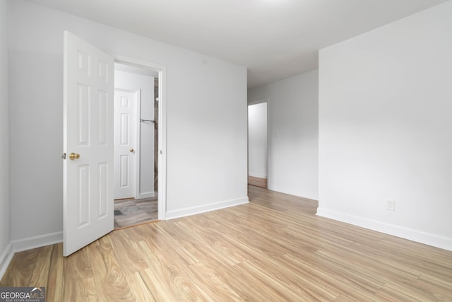 3781 Cherokee Trl, Suwanee, GA 30024 - spare room featuring light wood-style floors and baseboards