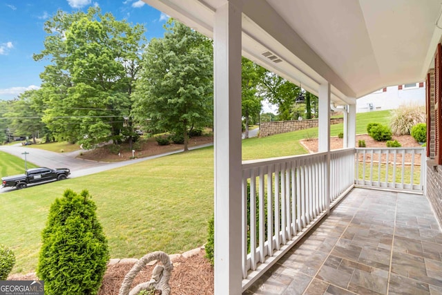3781 Cherokee Trl, Suwanee, GA 30024 - covered porch featuring a lawn