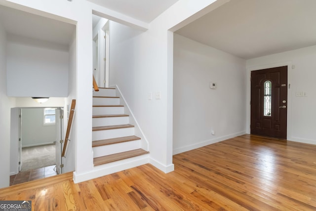 3781 Cherokee Trl, Suwanee, GA 30024 - foyer featuring wood finished floors and stairway