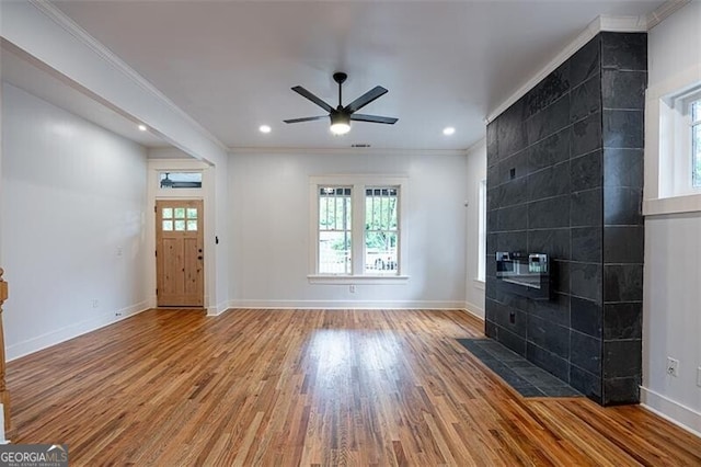 1120 Arlington Ave SW, Atlanta, GA 30310 - unfurnished living room featuring wood finished floors, ornamental molding, recessed lighting, ceiling fan, and baseboards