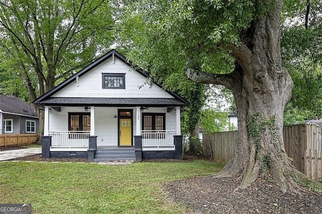 1120 Arlington Ave SW, Atlanta, GA 30310 - bungalow with covered porch, crawl space, fence, and a front yard