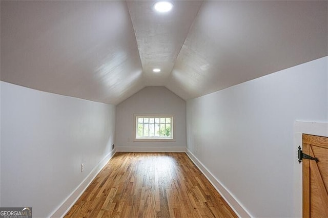 1120 Arlington Ave SW, Atlanta, GA 30310 - bonus room with baseboards, light wood-type flooring, and vaulted ceiling
