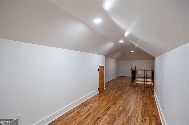 1120 Arlington Ave SW, Atlanta, GA 30310 - bonus room with light wood-type flooring, baseboards, lofted ceiling, and recessed lighting