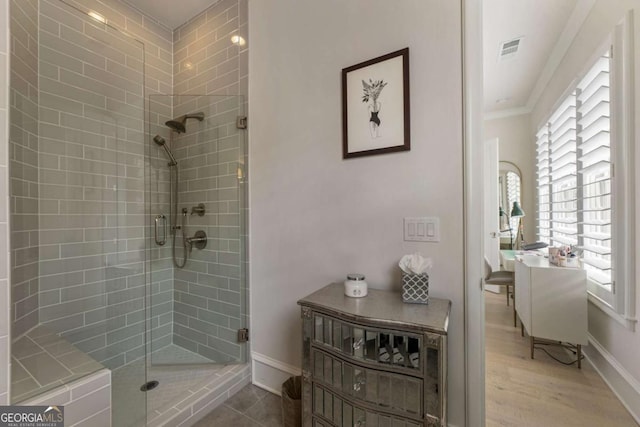316 S Esplanade, Alpharetta, GA 30009 - bathroom with a shower stall, baseboards, ornamental molding, and visible vents