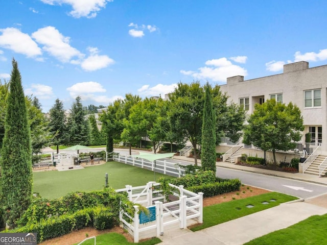 316 S Esplanade, Alpharetta, GA 30009 - view of home's community featuring a yard, stairway, and fence