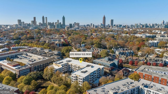 birds eye view of property with a city view