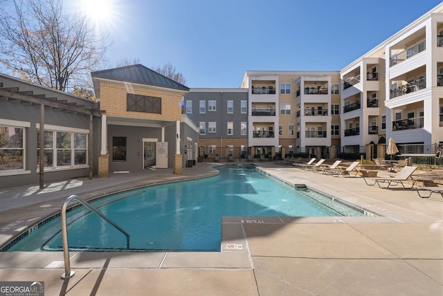 pool with a patio